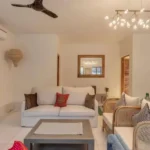 Villa Casa Brilhante Parra Goa 4 BHK Modern Living Room With Cane Furniture Sofa Seating Decorative