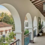 Villa Casa Brilhante Parra Goa Arched Balcony Walkway With Hanging Lantern Lights Open Corridor Tropical View