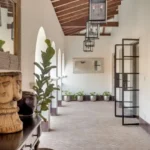 Villa Casa Brilhante Parra Goa Arched Corridor With Wooden Ceiling Hanging Lantern Lights Indoor Plants Open Walkway