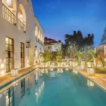 Villa Casa Brilhante Parra Goa Luxury Swimming Pool At Night With Ambient Lighting Tropical Plants Arched Villa Exterior