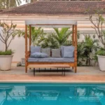 Villa Casa Brilhante Parra Goa Poolside Daybed With Tropical Landscape Wooden Cabana Cushioned Seating And Relaxing Outdoor Ambience