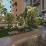 Vrindavan Malad West Landscaped Entrance Garden With Decorative Sculpture