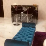 3 BHK Kuvar House Colaba Living Room with Blue Chaise and Bar Counter