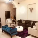 3 BHK Kuvar House Colaba Living Room with Sofa and Blue Chaise