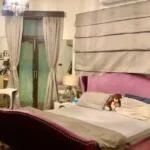 3 BHK Kuvar House Colaba Master Bedroom with Pink Bed