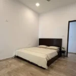 3 BHK One Avighna Park Bedroom with Minimal Bed and Open Door