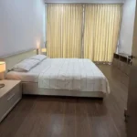 3 BHK One Avighna Park Bedroom with Window and Wooden Floor