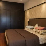 5 BHK Duplex Ashok Towers Parel Espresso Cabinet Gold Wallpaper Wood Floor Bedroom