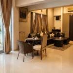 5 BHK Duplex Ashok Towers Parel Warm Toned Dining Set Balcony Garden View Living Dining