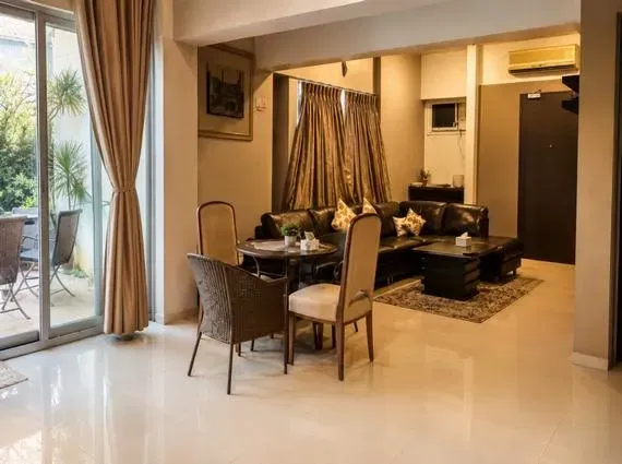 5 BHK Duplex Ashok Towers Parel Warm Toned Dining Set Balcony Garden View Living Dining