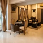 5 BHK Duplex Ashok Towers Parel Warm Toned Dining Set Balcony Garden View Living Dining