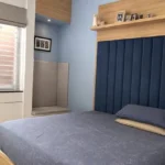 5 BHK Duplex Ashok Towers Parel Blue Upholstered Headboard Roman Blind Compact Bedroom