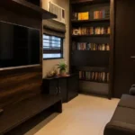 5 BHK Duplex Ashok Towers Parel Dark Wood TV Unit Floor To Ceiling Book Collection Study