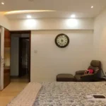 5 BHK Lake Superior Powai Guest Bedroom with Recliner