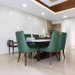 5 BHK Lake Superior Powai 6 Seater Dining Area with Green Chairs