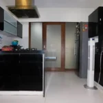 5 BHK Lake Superior Powai Modular Kitchen with Black Cabinets