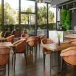 Celestria New Palm Beach Airoli Wood Table Green Wall Bar Counter Indoor Lounge