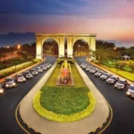 Kiran Canary Forest Plots For Sale Aamby Valley Lit Arch Gate Dusk Grand Township Entrance