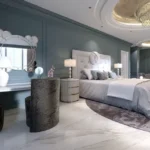 The Reserve Sector 11 Kharghar 3 BHK Grey Marble Floor Red Accent Pendant Lit Bay Seat Bedroom
