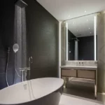 The Reserve Sector 11 Kharghar 3 BHK Backlit Mirror Marble Vanity Matte Black Fixture Bathroom