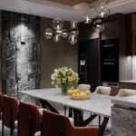 The Reserve Sector 11 Kharghar 3 BHK Rust Chair Dark Cabinet Floral Centrepiece Dining Room