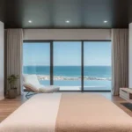 Rustomjee Cama Bandstand Bandra West Master Bedroom with Designer White Chair