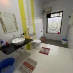 3 BHK Beach Villa Nagaon Bathroom with Colorful Accent Tiles