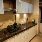 4 BHK Lake Front Solitaire Powai Modern Kitchen with White Cabinets
