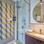 4 BHK Villa Saral Alibaug Bathroom with Geometric Tile Shower