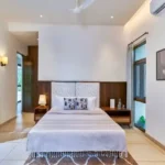 4 BHK Villa Saral Alibaug Bright Bedroom with Double Bed