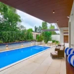 4 BHK Villa Saral Alibaug Poolside Seating and Covered Patio