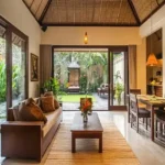 Asaya 4 BHK Villas Assagao Goa Living Room With Couch Table With Flowers