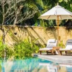 Asaya 4 BHK Villas Assagao Goa Umbrella Chair Around Outdoor Swimming Pool