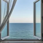Lotus Avalon Bandra Bandstand Open Window of Room with Sea View in Front