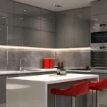 Lotus Odyssey Bandra Bandstand Minimalist 5 BHK Kitchen with Grey Cabinets White Island Red Chair Stools