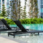 Lotus Odyssey Bandra Bandstand Pool Recreation Area Grey Deck Chairs