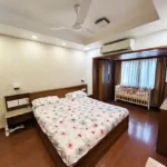 3 BHK Maker Tower Cuffe Parade Bedroom With Wooden Flooring