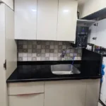 3 BHK Maker Tower Cuffe Parade Kitchen With Black Countertop