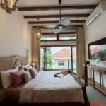 3 BHK Villa Amayah Villas Assagao Goa Bedroom With Television And Balcony