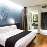 Daivi Eterneety Borivali Modern Bedroom With Ensuite Bathroom