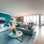 Daivi Eterneety Borivali Spacious Living Room With Blue Sofas