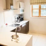 3 BHK Eirene Heights Dadar Kitchen with Window and Breakfast Counter
