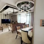 3 BHK Oberoi Exquisite Goregaon Living and Dining Room with Chandelier