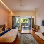 3 BHK Villa Infiniti Bay Dabolim Bogmalo Beach Goa Bedroom with Blue Throw and Balcony