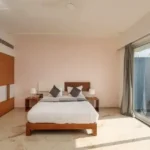 3 BHK Villa Infiniti Bay Dabolim Bogmalo Beach Goa Bedroom with Marble Floor and Glass Doors