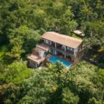 4 BHK Villa Khopoli Aerial View with Pool and Surrounding Trees
