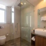 4 BHK Villa Khopoli Bathroom with Glass Shower and Vessel Sink