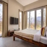 4 BHK Villa Khopoli Bedroom with Large Windows and Woodland Views