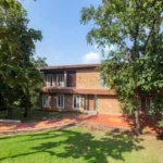 4 BHK Villa Khopoli Exterior with Green Lawn and Trees