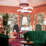 4 BHK Villa Ballad Angela Boheim Siolim Goa Sitting Room with Green Sofa and Coral Walls
